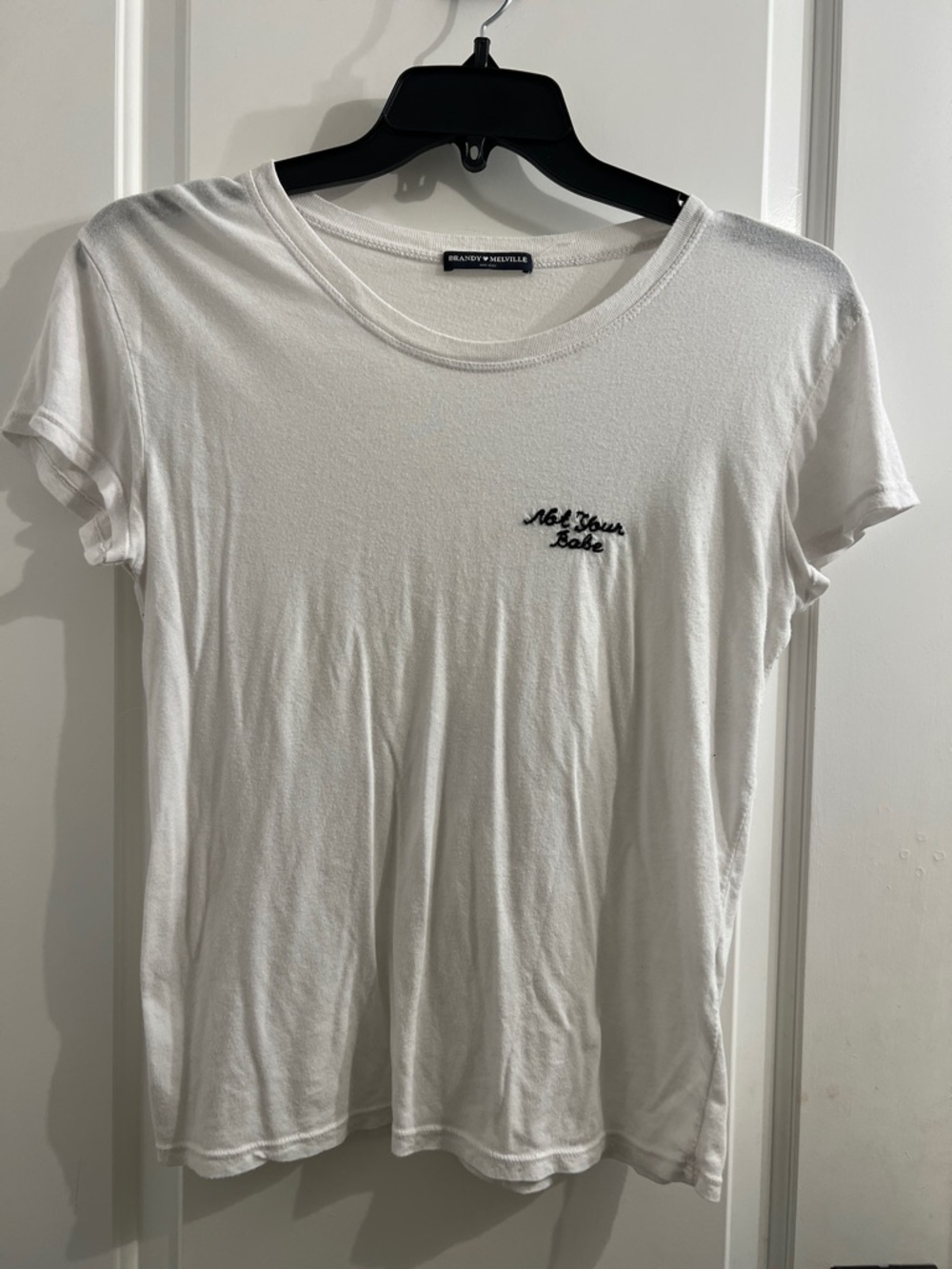 Brandy Melville White Tee with Black 'Not Your Babe' Embroidery